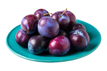 Fototapeta premium Plums on green plate close-up