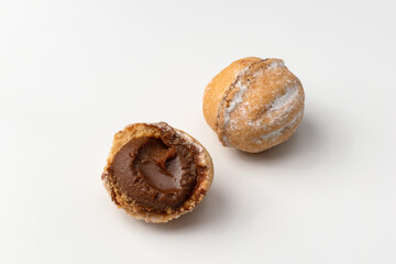 Walnut-shaped cookies with caramel filling. Close-up.