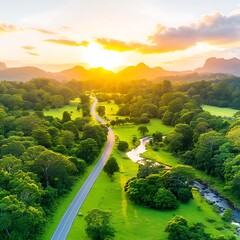 Scenic Winding Road Through Lush Green Valley at Sunset Aerial View of Nature's Beauty