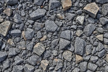 Fototapeta premium Detailed Close-Up of Small Gray and Beige Gravel Stones for Construction and Landscaping Texture or Background, Full Frame 