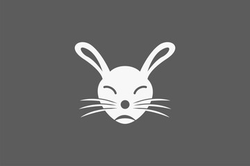 Cute close eyes rabbit head face logo