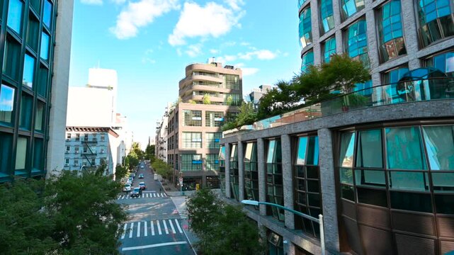 New York City,USA, August 20, 2024. Panoramic footage from the High Line down to the street level. The gaze goes from the parapet to the surrounding buildings to the street view. Beautiful summer day.