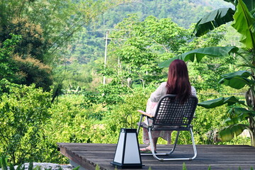 young woman on a vacation in the forest