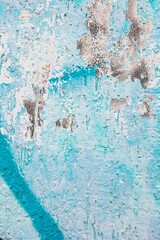 Distressed wall texture in turquoise with peeling paint. 90s grunge style, vintage decay, rustic...