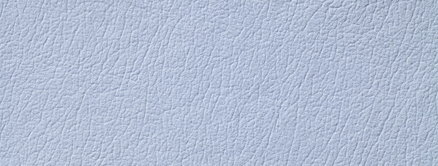 Light blue leather texture background with pattern, macro. Structure pastel sky textile backdrop