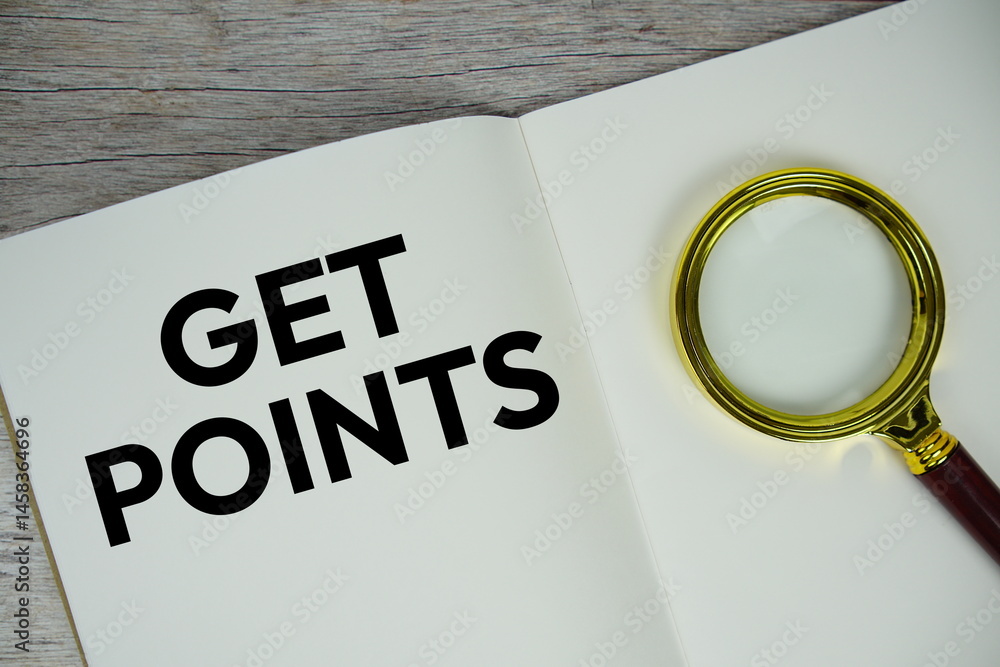Poster get points text written on chalkboard with alarm clock on wooden background