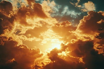 Dramatic sunset with golden clouds in the sky