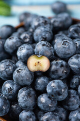 fresh blueberry fruit on woooden table.