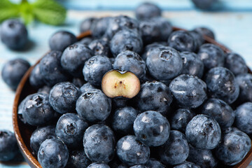 fresh blueberry fruit on woooden table.