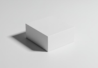 Geometric white box on a seamless background with a subtle shadow creating a minimalist composition