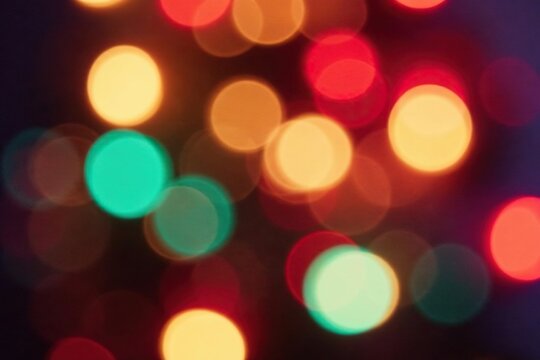 Out of focus holiday illumination, a colorful background of circular light patterns for a cheerful and bright Christmas mood , bokeh, illumination