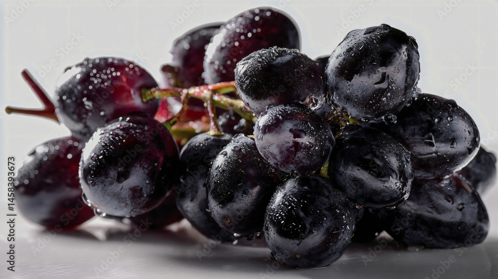 Poster high quality image of a cluster of dark grapes sequester on a livid background, ideal for profession