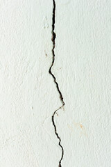 Obraz premium Large long crack or damage on concrete wall. Problem issue from low quality concrete, old, weathered or earthquake. Need repair by epoxy filler for flat smooth.