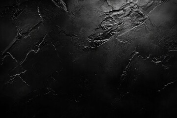 Dark, textured, stone-like surface