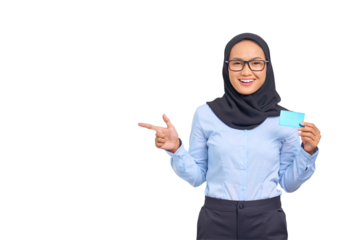 Portrait of smiling young Asian woman pointing fingers at copy space and holding credit card isolated on transparent background
