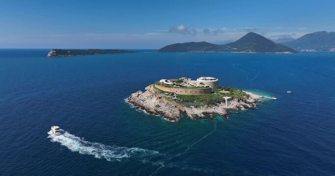 Boat Traveling near Mamula Island Hotel Montenegro - Aerial Approach