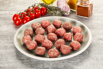 Uncooked raw beef meatball minced