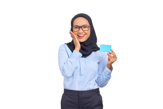 Portrait of smiling young Asian woman touching face cheek, holding credit card isolated on transparent background