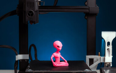 3D printer and finished product, advertising photo printing objects. Modern technical 3D printing, copy space.
