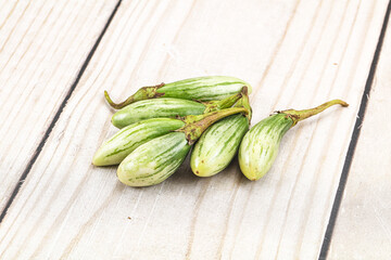 Small organic young green eggplant