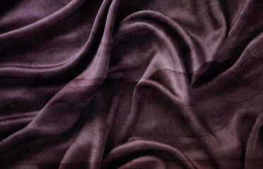Un tejido oscuro suave y fluido con pliegues elegantes y sombras, creando profundidad y textura lujosa.Sinfonía visual de elegancia fluida, donde el movimiento de la tela se convierten en poesía.