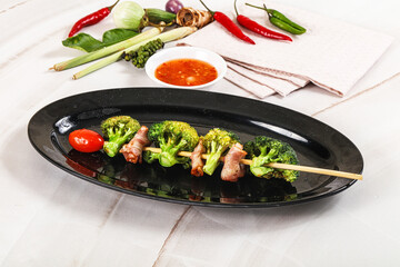 Thai Street foof satay with bacon and broccoli