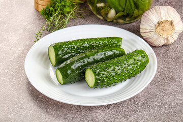 Homemade lighty salted cucumbers with herbs