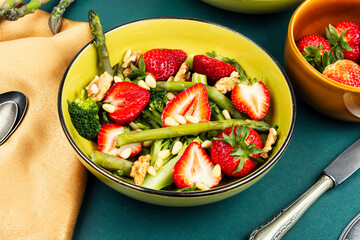 Tasty strawberries, asparagus salad.