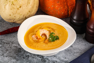 Pumpkin cream soup with prawns