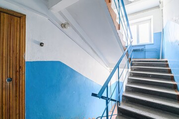 interior apartment public place, house entrance. doors, walls, staircase corridors. staircase in a...