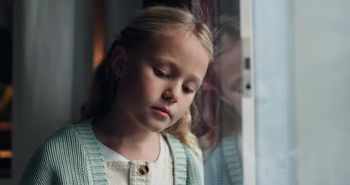 Sad, thinking and window with child at home for mental health, youth crisis and adoption fail. Mistake, foster care trauma and abandon fear with young girl at house for depression and reflection