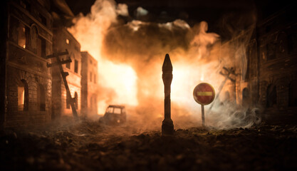 Nuclear war apocalypse concept. Explosion of nuclear bomb in city. City destroyed by atomic war. Creative artwork decoration in dark.