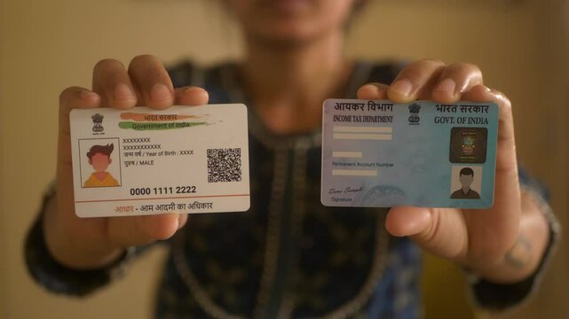 Indian woman reveals Indian PAN card and Aadhaar card, government programmes, closeup