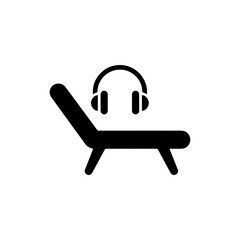 Black Icon of Lounge Chair with Headphones on Armrest for Relaxation