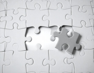 Puzzle pieces not fitting together show disrupted commerce.