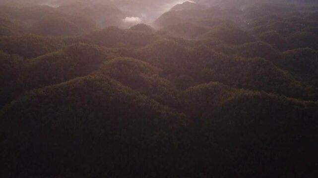 Sunset on a hill with beautiful sky and light