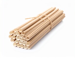 Bundled light brown straws tied with twine, isolated against a white background