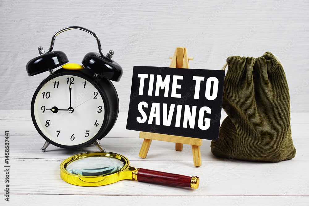 Poster time to saving text with alarm clock and magnifying glass on wooden background