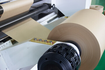 A roll of technical paper installed in the machine
