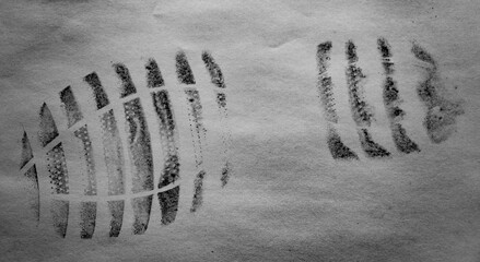 Shoe print on white surface