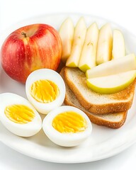 Budget friendly breakfast boiled eggs toast and apple slices a simple nutrient balanced meal thats easy on the wallet