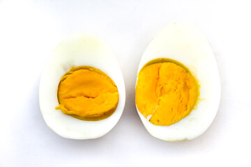 halved boiled egg isolated on white background