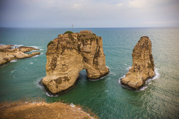 Famous Pigeon Rocks (Raouche Rocks) in southern Beirut during sunset, Lebanon