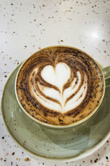 A Cup of Cappucino on Terrazzo Table