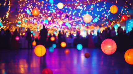 Obraz premium Blurred view of a large party with colorful lanterns and lights. People are dancing and enjoying the celebration. 