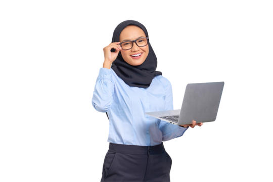 Portrait of smiling young Asian woman holding a laptop and touching eyeglass isolated on transparent background
