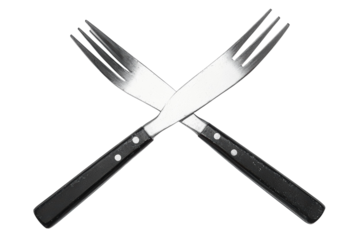 Crossed forks on black background