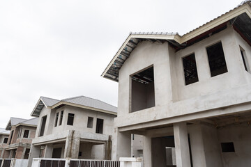 Housing Estate Construction. Housing estate projects under construction. Construction of housing. Housing over supply concept