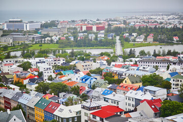 Obraz premium Aerial scenic view of Reykjavik, Iceland on a foggy and rainy summer day.