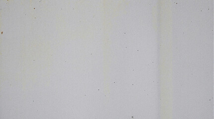 Textured wall in the frame: A close-up of a clean, textured wall, capturing the subtle details of its surface and highlighting the interplay of light and shadow.